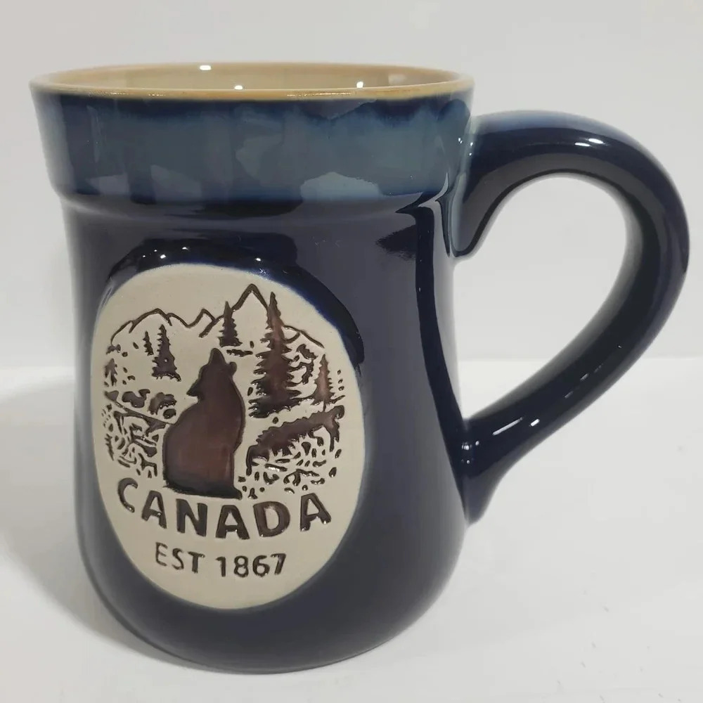 Canada 4.5" by 3.5 Round Blue Mug with Wolf/Forest Background EST 1867. - Picture 1 of 4
